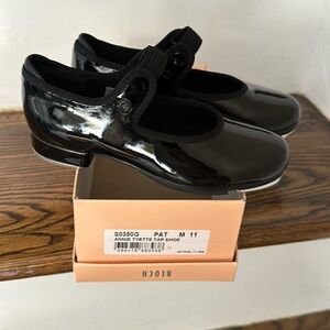 BLOCH black patent tap shoes .